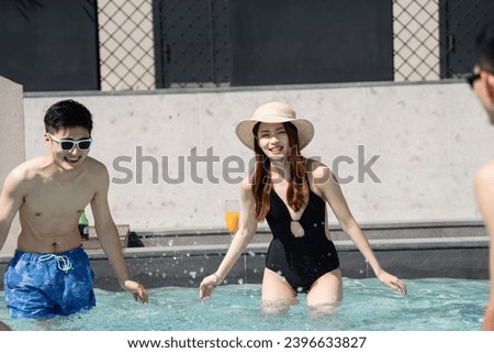 Playing in the pool of young couples