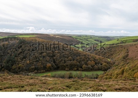 Landscape photo of the autumn colours in the Doone valley in Exmoor National Park