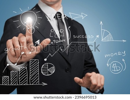 Hand of businessman with a visual graphic screen element.