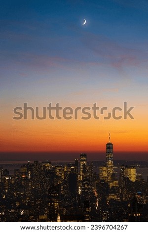 New York City landscape with skyscrapers and moon at dusk