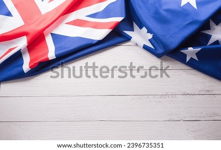 Happy Australia day concept. Australian flag against white wooden background. 26 January.