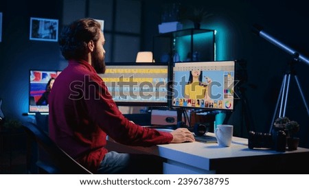 Photographer arriving at work, starting shift by using image editing software on PC display in multimedia creative studio. Photo editor drinking coffee and using photographs retouching program
