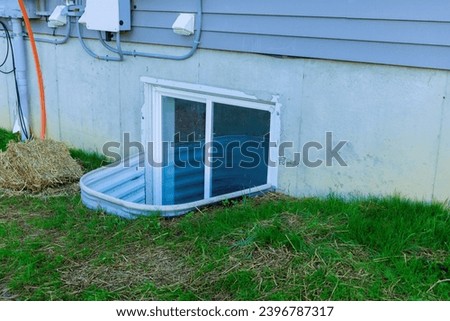 Window well installing to basement for new house at under construction Royalty-Free Stock Photo #2396787317