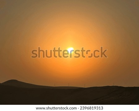 Beautiful sunrise over Al Qudra desert sand dunes in Dubai emirate, United Arab Emirates, Middle East.