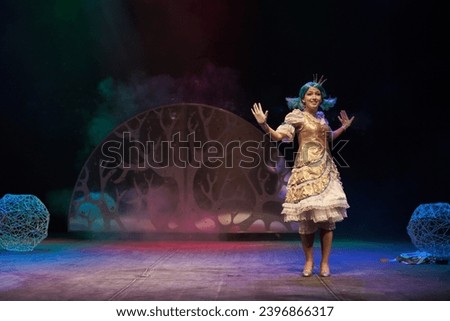 Girl in princess costume plays a children's party  Royalty-Free Stock Photo #2396866317