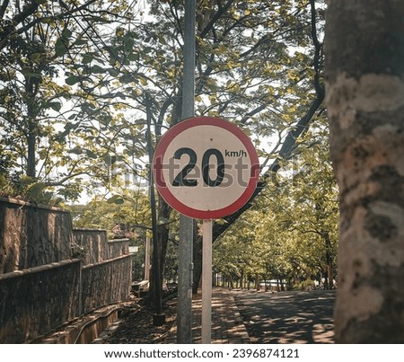 Slow to 20 km per hour sign in Campus