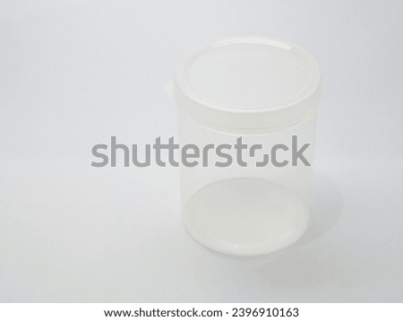 Transparent plastic jar made from polypropylene, isolated on white background Royalty-Free Stock Photo #2396910163