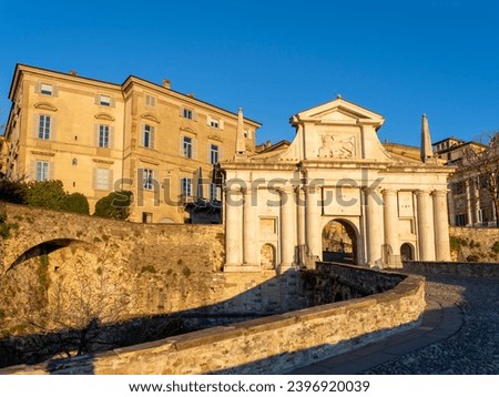 Bergamo, Italy. The old town. One of the beautiful city in Italy. Landscape at the old gate Porta San Giacomo during sunrise Royalty-Free Stock Photo #2396920039