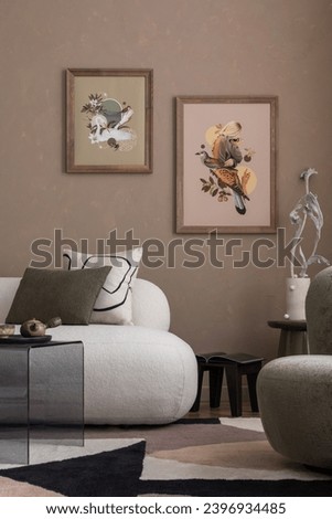 Creative composition of minimalistic living room interior with mock up poster frame, boucle  sofa, green armchair, patterned rug, pillows, brown wall and personal accessories. Home decor. Template.
