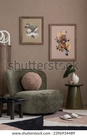 Warm and cozy living room interior with mock up poster frame, patterned rug, green armchair, round coffee table, brown wall, black stool, slippers and personal accessories. Home decor. Template.