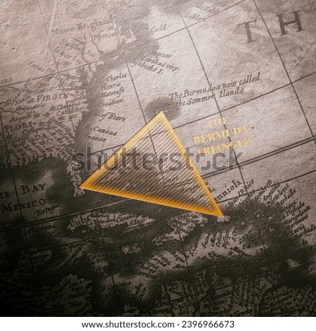 A meticulously detailed old map featuring the Atlantic Ocean prominently marks the mystifying Bermuda Triangle, stirring curiosity about its legendary enigmas. Royalty-Free Stock Photo #2396966673