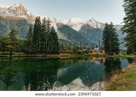 Beautiful view of Lac des Gaillands with Mont Blanc massif and wooden chalet in Chamonix town at French Alps, Savoie, France Royalty-Free Stock Photo #2396971027