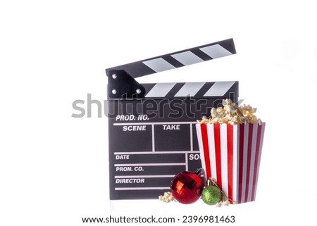 Christmas movie night part, Gather friends and family for home cinema. Invitations to New Year, Christmas movie premiere with clapperboard, Christmas tree bauble isolated on white background