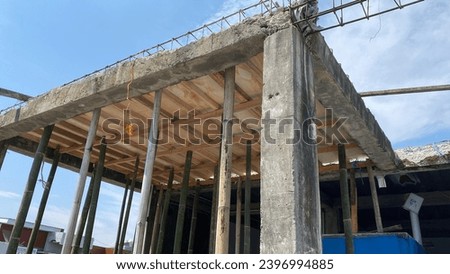 Traditional construction 2nd floor using bamboo as stagger Royalty-Free Stock Photo #2396994885