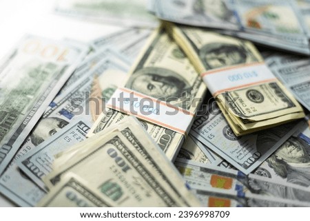 American dollars in one hundred banknotes. Lot of dollars close up