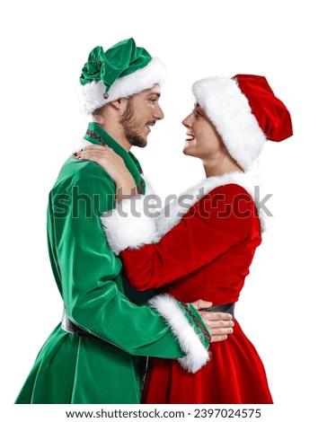 Santa Claus helpers on white background and free space for your decoration. Two lovers in red clothes. 