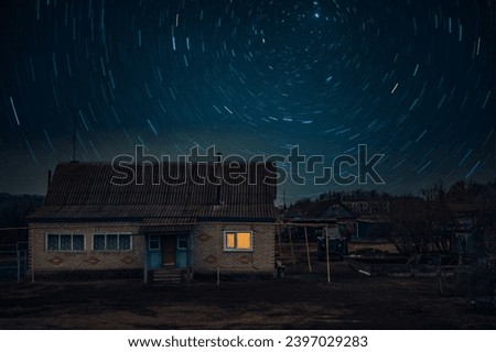 Star tracks above the village house.