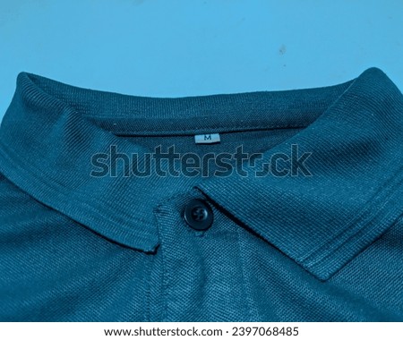 polo shirt collar with size M marking, Shirt Size Clothes Label Symbol On Clothing
