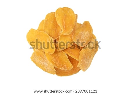 Top view of sliced dried mango isolated on white background. Copy space. Royalty-Free Stock Photo #2397081121