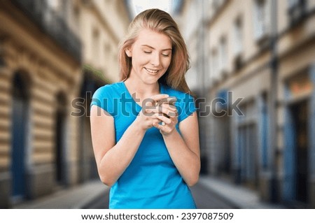 Happy woman hold mobile phone