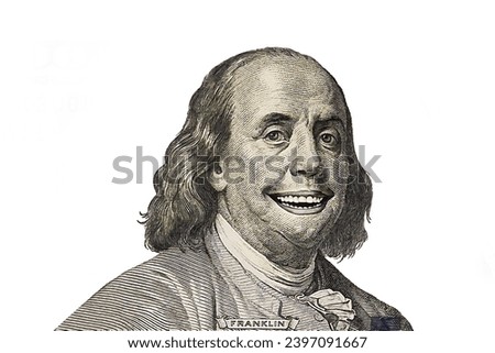 Benjamin Franklin smiling portrait cut from new 100 dollar banknote on white background