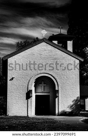 A church photographed in black and white film noir style.
