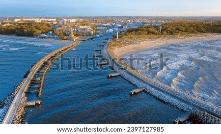 Aerial view of harbour and lighthouse in Kolobrzeg, Poland. Natural light, drone photography.
