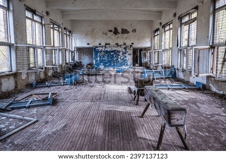 Gym in school in Illinci abandoned village in Chernobyl Exclusion Zone in Ukraine Royalty-Free Stock Photo #2397137123