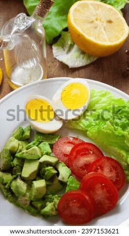 Healthy lunch with fresh vegetables and eggs.Vertical picture