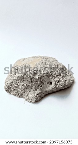 White lime stone, sedimentary rock. Isolated white. 