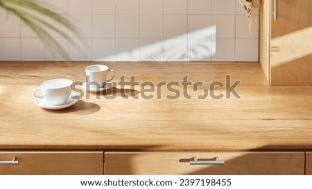 A sunny kitchen with white tile walls, a wooden table and sink. Royalty-Free Stock Photo #2397198455