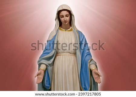 Closeup of Beautiful Statue of Our lady of grace virgin Mary view with blurred bright Golden Rose background in the church, Thailand. selective focus. Royalty-Free Stock Photo #2397217805