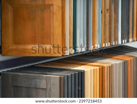 wood cabinet door samples in market in a row Royalty-Free Stock Photo #2397218453