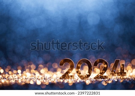 Happy New Year 2024 - Christmas Gold Blue Glitter Celebration Royalty-Free Stock Photo #2397222831