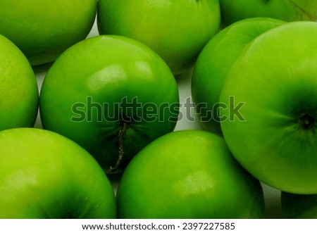 green jujube, on a white background, close-up