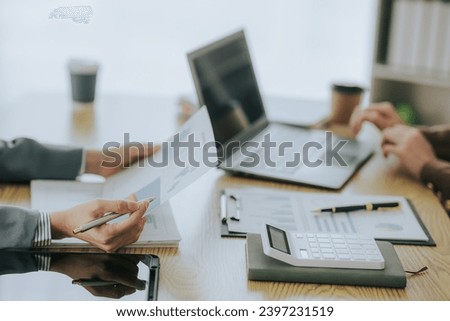 Business consultation meeting to analyze and discuss the financial report situation in the conference room. investment consultant financial advisor and accounting concepts Royalty-Free Stock Photo #2397231519