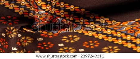 silk fabric of brown color with red and yellow colors, dense fabric, double-sided based on triacetate fibers. Background, Pattern Decor Royalty-Free Stock Photo #2397249311