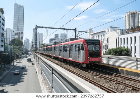 LRT Line 1 train leaving United Nations Station Royalty-Free Stock Photo #2397262757
