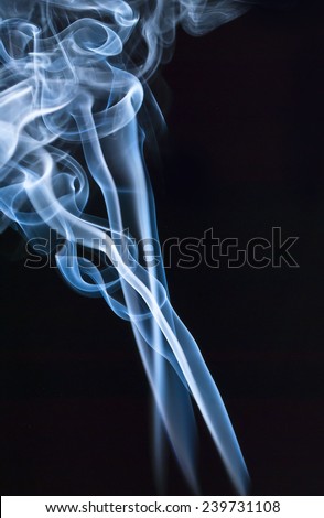 abstract photo of blue Smoke on a dark