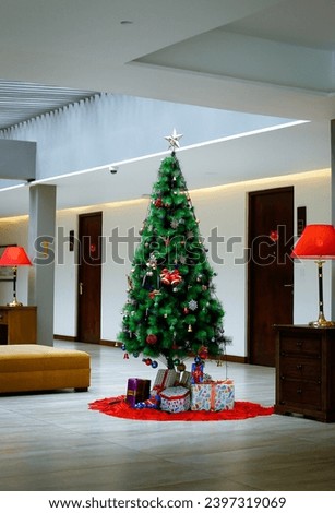 Christmas decoration. Hanging Red balls on pine branches