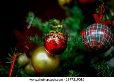Christmas decoration. Hanging Red balls on pine branches