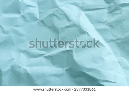Background of crumpled blue paper