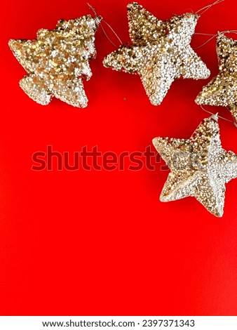 Beautiful Christmas decorations, shiny toys on a bright red background. Christmas poster design. Poster for the new year