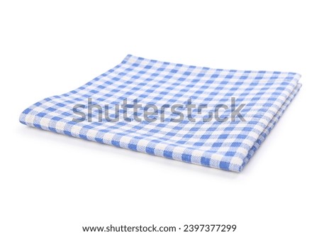Folded checkered napkin on white background Royalty-Free Stock Photo #2397377299
