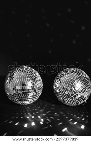disco balls on a black background Royalty-Free Stock Photo #2397379819