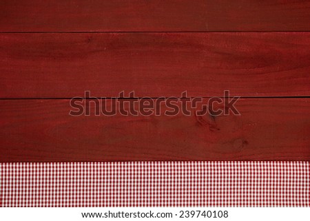 Antique red wood sign with red and white gingham fabric border