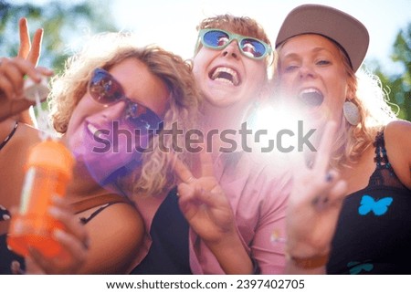 Portrait, peace sign and funny friends in sunglasses outdoor, blowing bubbles and laughing together in summer. Face, women and group of girls with v hand gesture, excited and lens flare in nature