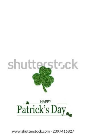 Happy St. Patrick's Day banner.Holiday background.St Patricks Day frame against a white background. Flat lay shamrocks.Copy space.Patrik's day banner Royalty-Free Stock Photo #2397416827