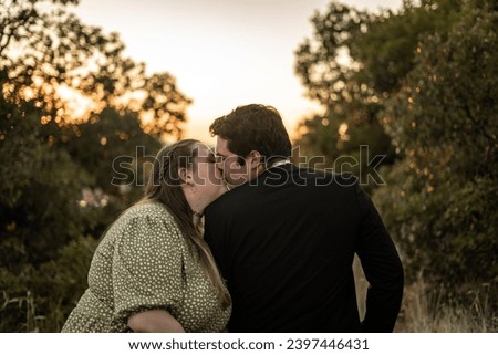 sage green warm tone photo of christian young couple portraits in their Sunday best engagement wedding pictures