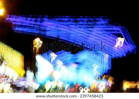 blurred light display taken at night time taken using a slow shutter speed on a camera.